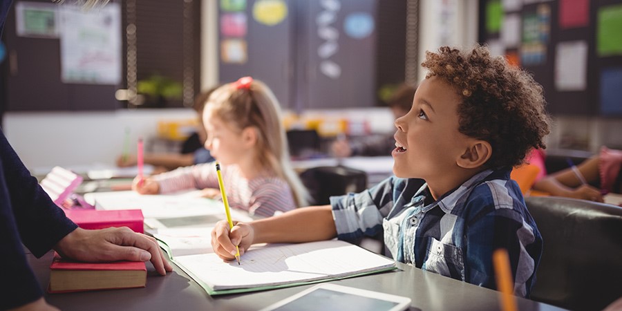 A student listenes Attentively to the teacher